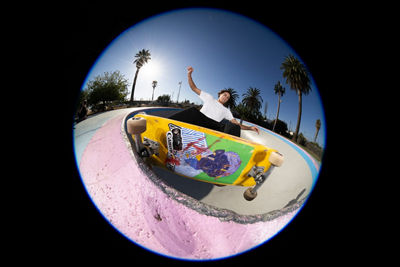 Fisheye View of a Skateboarder Doing a Trick