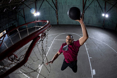 Fisheye View of a Skateboarder Doing a Trick