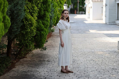Person in a White Dress Standing