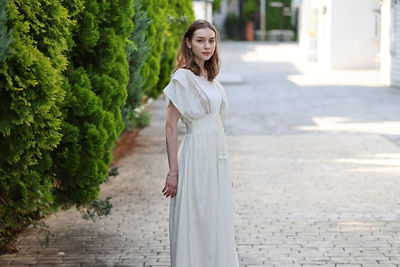 Person in a White Dress Standing
