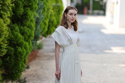 Person in a White Dress Standing