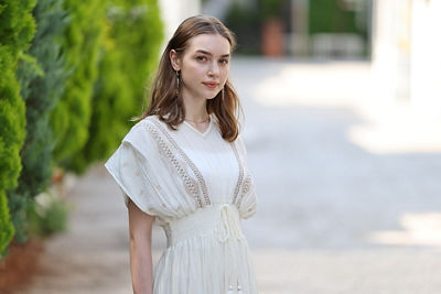 Person in a White Dress Standing