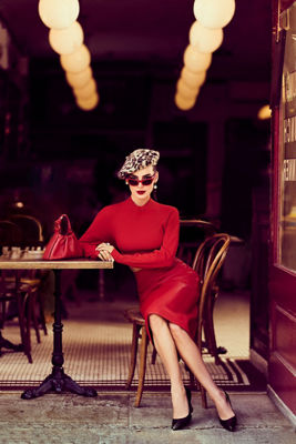 Model Sitting at a Table