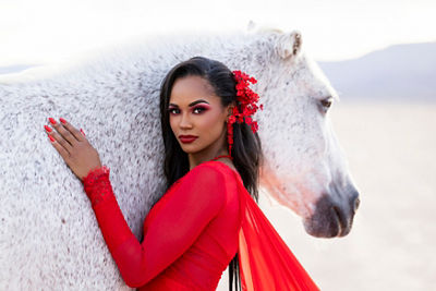 Person Hugging Horse