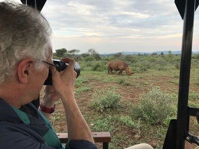 Image of Rick photographing a white rhino