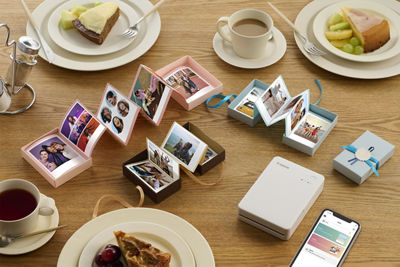 SELPHY QX20 - On a Table with Photo Albums with Breakfast