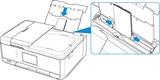 Slide the right guide to align both guides against the edges of the envelopes