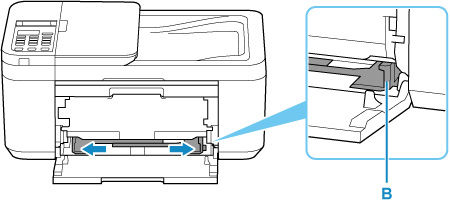 Slide the right paper guide