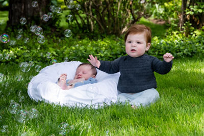 Baby and Child on Grass