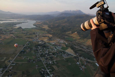 Photographer Taking a Picture From Very High Up in the Air