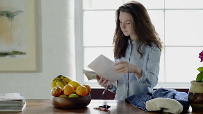 Person Looking at Mail