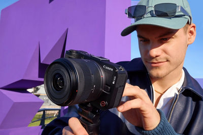 Person Using EOS R V Camera