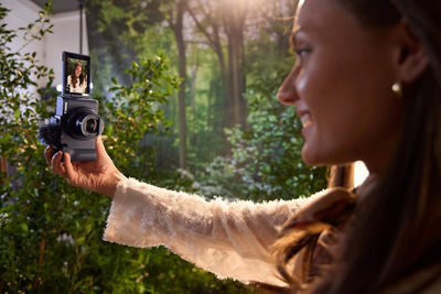 Person Using PowerShot V Camera