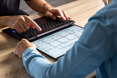 VAIO Laptop Open 180 Degrees Being Used By Two People