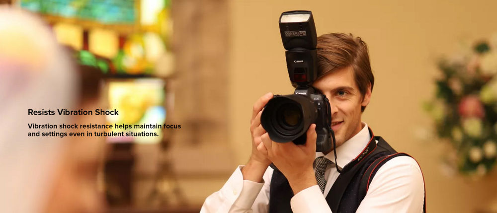 Photographer wearing a vest