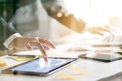 Image of a man working on a laptop
