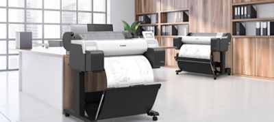 Image of a white CEO office corner with wooden table