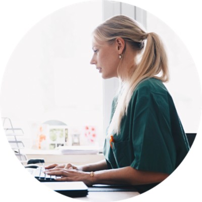 Woman working at a desktop computer