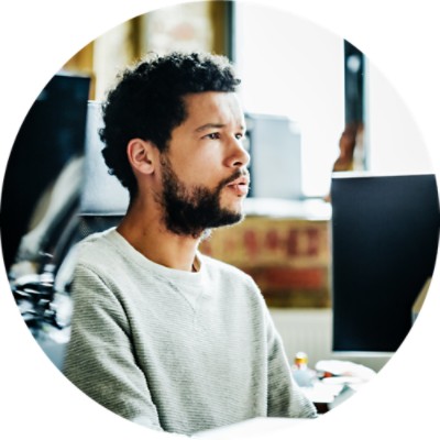 Man looking at computer monitor