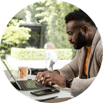 Man typing on laptop computer