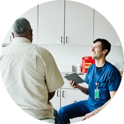 Nurse speaking to patient