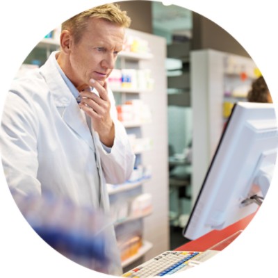 Pharmacist using computer