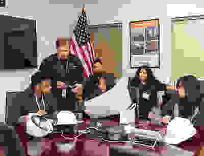 Students participating in Constellation's annual Youth Energy Summit shadow members of the company's nuclear team.