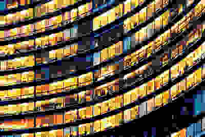 building with lights on and off