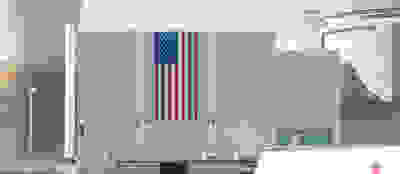 american flag hanging outside the Crane Clean Energy Center