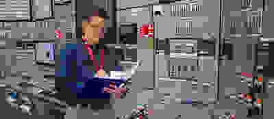 Man in control room