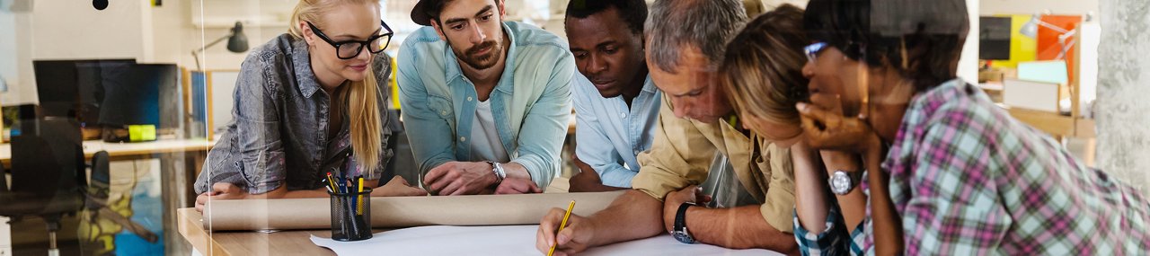 Close up of a coworkers working together on a project