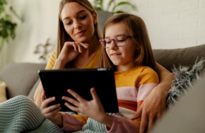 Mom and daughter on iPad