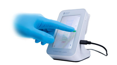 X-Smart Apex Locator with illuminated touchscreen display, showing bright high resolution interface.