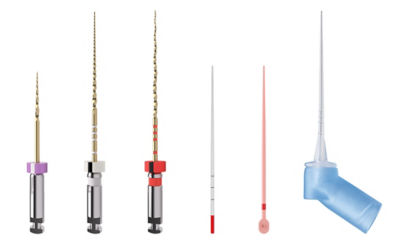 Four TruNatomy endodontic files with colored handles for different canal treatments.