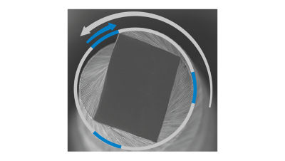 View of a WaveOne Gold endodontic file showing its parallelogram-shaped cross section inside a circular holder.