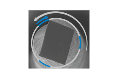 Irrigation needle icon with liquid spray lines, surrounded by a red gradient circle.