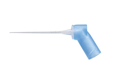 Gloved hand holding a flexible endodontic needle for atraumatic root canal procedures.