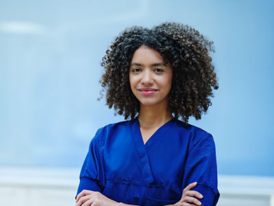 healthcare professional in blue scrubs