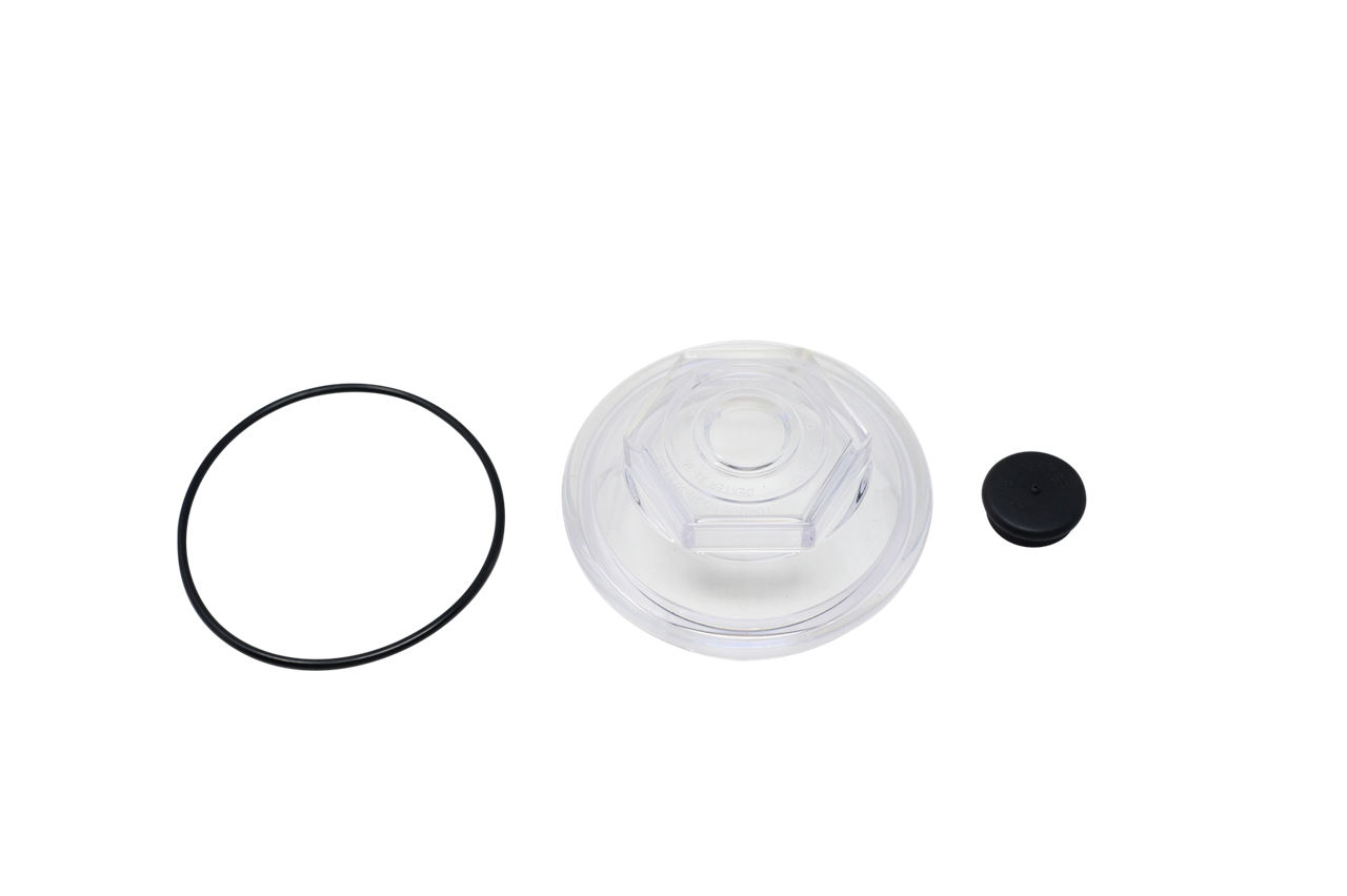 Dexter RG04-270 trailer hub oil cap kit with clear polycarbonate cap, O-ring, and plug.