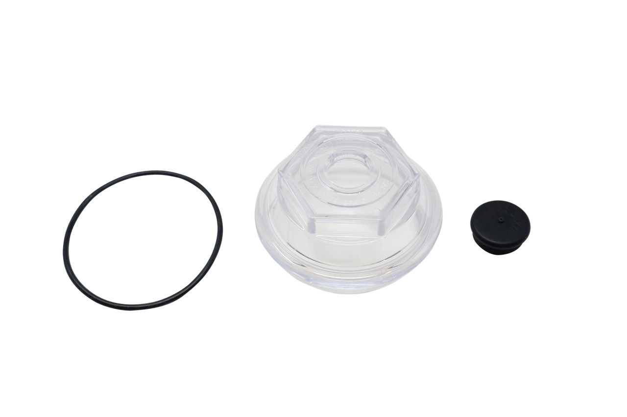 Dexter RG04-300 trailer hub oil cap kit with clear polycarbonate cap, O-ring, and plug.