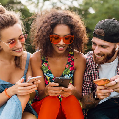Couple smiling at phone