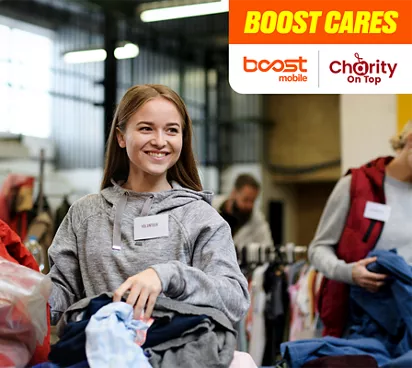 Woman helping sort through donations