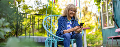Woman on phone with Unlimited Premium Plan