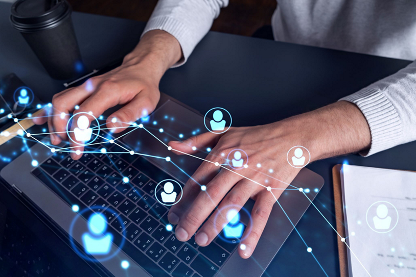 Someone hovers their hands over the keyboard of an AI-powered PC.