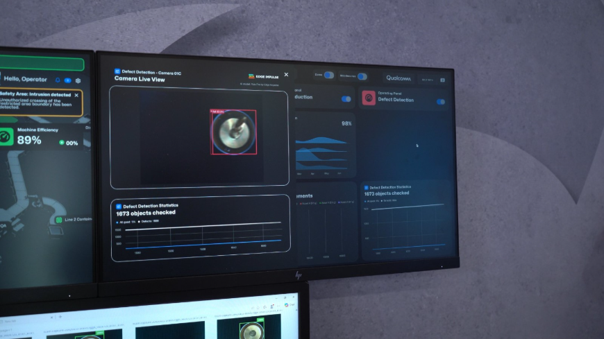 Figure 1. The FactoryPulse Vision AI pipeline in action -  the left display shows the safety-area alert with an intrusion-detected banner; the right display shows the defect-detection camera view with a live bounding box and confidence score drawn over the conveyor feed. 