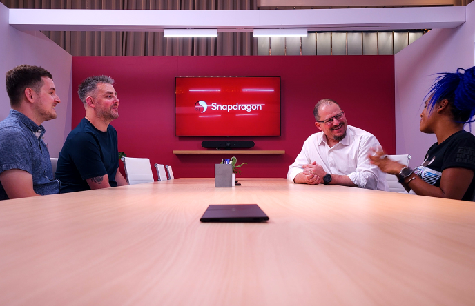 Kevin Breeze, Lucy Hedges, and Paul Smith interview Qualcomm CEO Cristiano Amon live at Computex. They are backdropped by the Snapdragon logo.