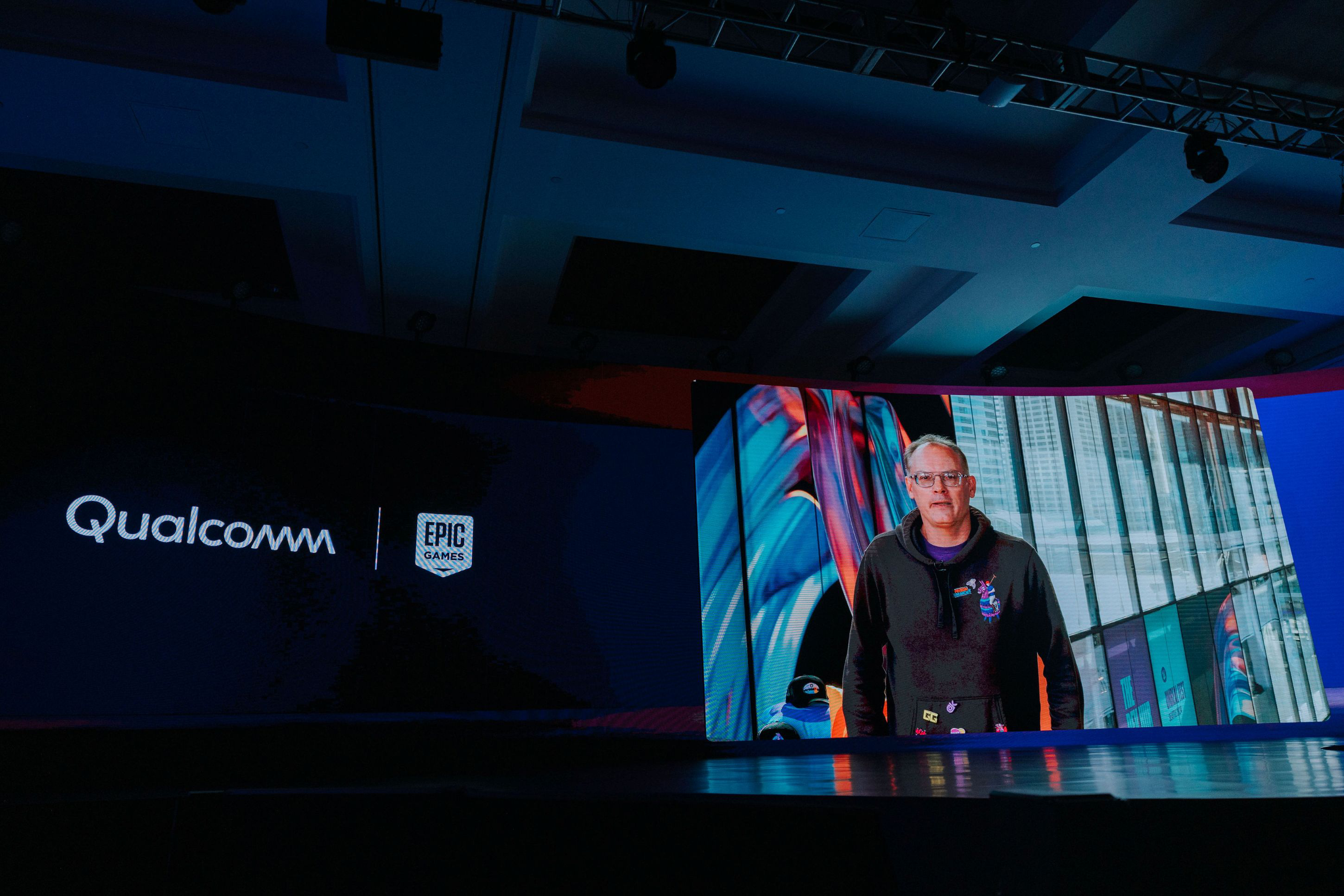 Slide https://s7d1.scene7.com/is/image/dmqualcommprod/TimSweeney?$QC_Responsive$&fmt=png-alpha
