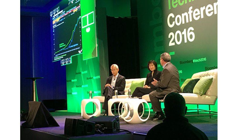 The author and U.S. Patent and Trademark Office Director Michelle Lee share the stage.
