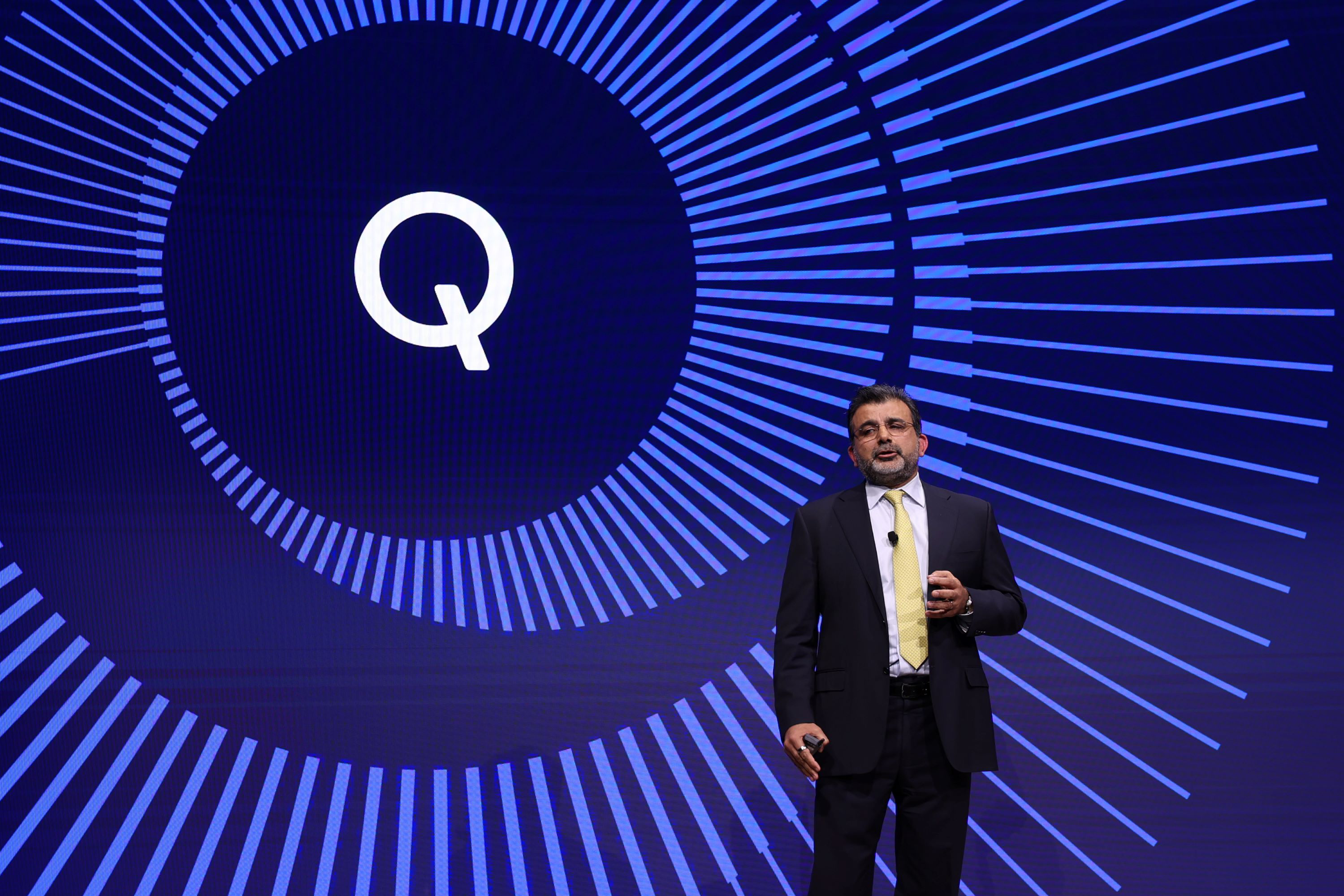 Nakul Duggal, Group GM, Automotive, Industrial and Embedded IoT, and Cloud Computing, on stage at Qualcomm Investor Day 2024.