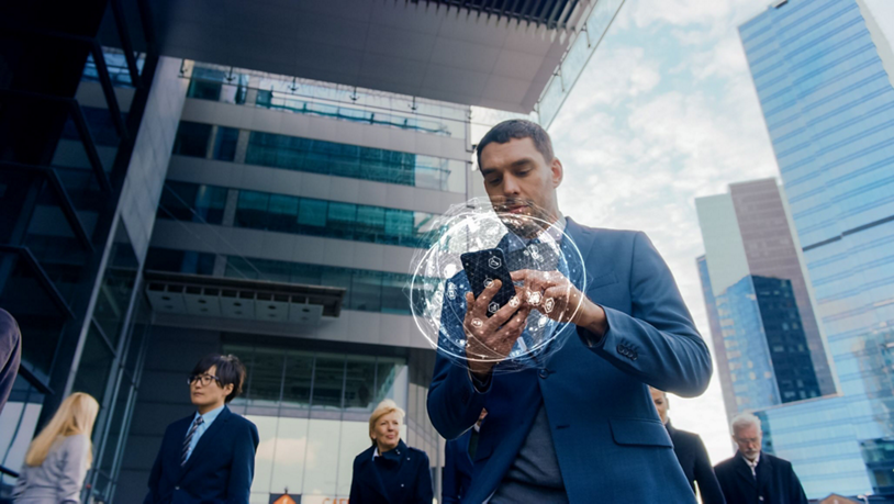 A businessman uses a generative AI device for travel guidance.